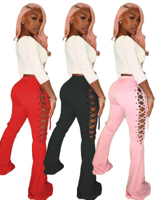 Fashion casual solid color eyelet flared pants ML7415