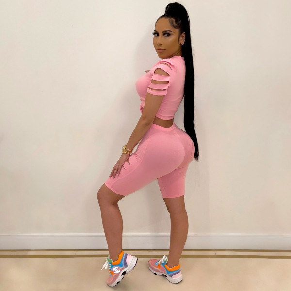 Two-piece sexy casual sports suit with solid color burnt holes and navel exposed A3277