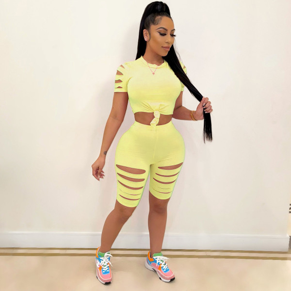 Two-piece sexy casual sports suit with solid color burnt holes and navel exposed A3277