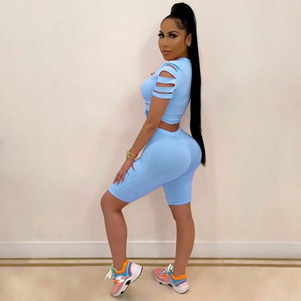 Two-piece sexy casual sports suit with solid color burnt holes and navel exposed A3277