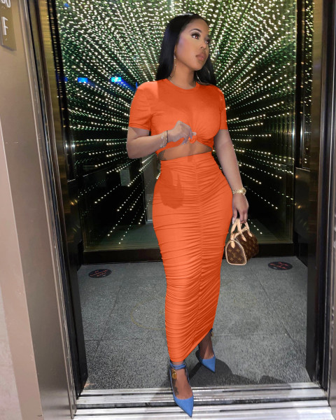 New solid color pleated skirt short sleeve two-piece suit KY3068