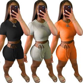 Fashion small pit strip solid color round neck short-sleeved shorts two-piece set WJ5225
