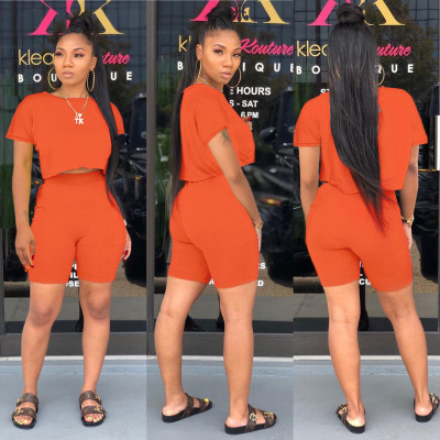 Fashion round neck short-sleeved sweater pocket two-piece shorts suit WY6780