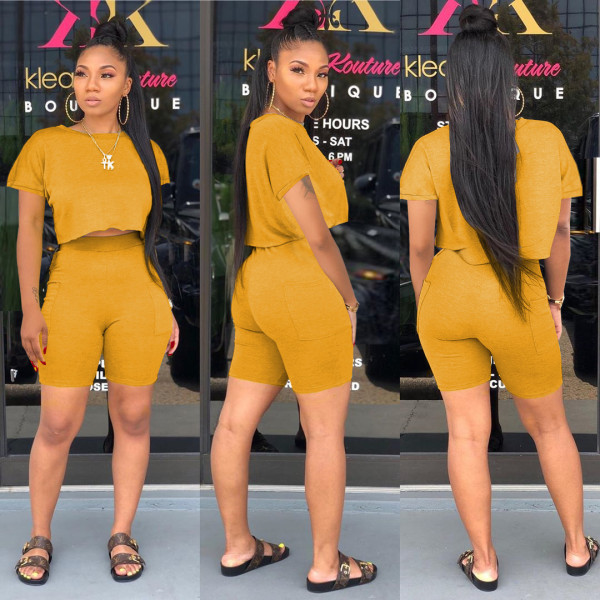 Fashion round neck short-sleeved sweater pocket two-piece shorts suit WY6780