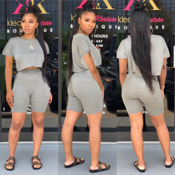 Fashion round neck short-sleeved sweater pocket two-piece shorts suit WY6780