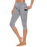 New style yoga pants solid color peach hip tight-fitting slimming sports seven-point side pocket quick-drying fitness women's pants 593472933285-1