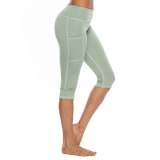 New style yoga pants solid color peach hip tight-fitting slimming sports seven-point side pocket quick-drying fitness women's pants 593472933285-1