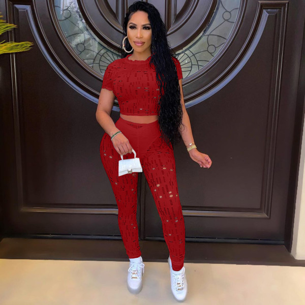 Autumn and summer women's fashion sexy ripped round neck solid color sports two-piece suit Y10016