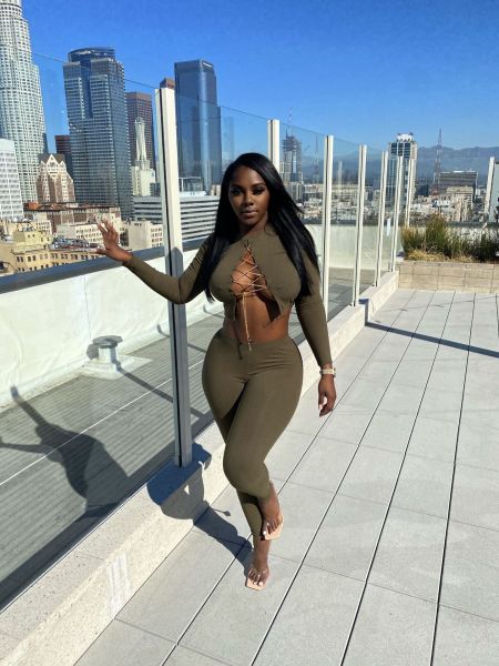 Autumn and winter sexy casual solid color round neck metal chain hole long sleeve two-piece suit JP1051