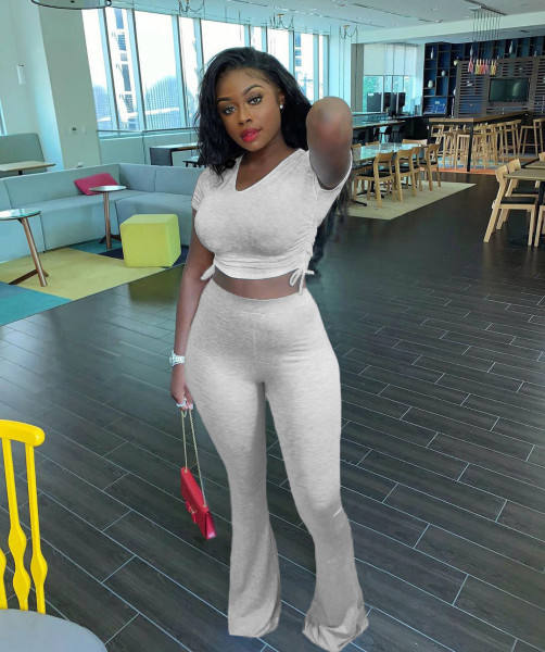 Solid color pleated top and big flared trousers two-piece suit LM8277