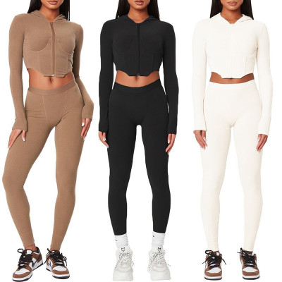 2021 autumn European and American cross-border foreign trade women's new style hooded irregular long-sleeved blouse tight trousers suit women K21S05093