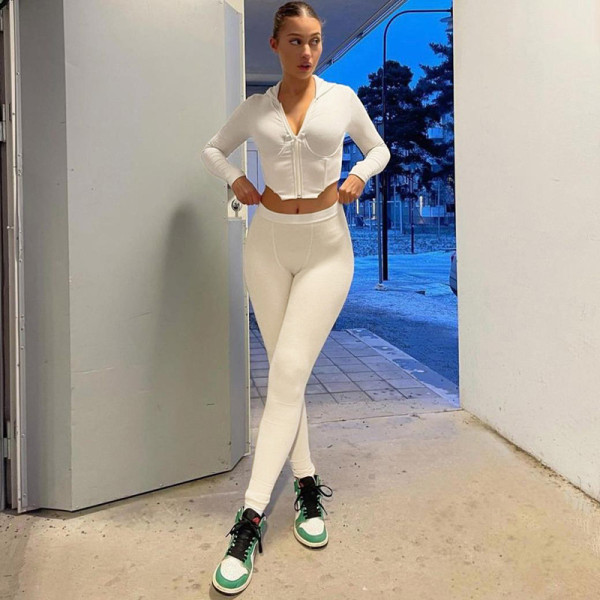 2021 autumn European and American cross-border foreign trade women's new style hooded irregular long-sleeved blouse tight trousers suit women K21S05093