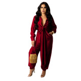 Explosive style solid color lace-up long-sleeved cool women's jumpsuit F119
