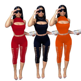 Pure color casual broken hole burnt flowers fashionable sexy casual suit OM9058