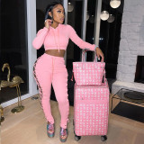 Autumn and winter style European and American fashion corn eyelet strap solid color pants suit sexy hollow sweater two-piece suit G1035
