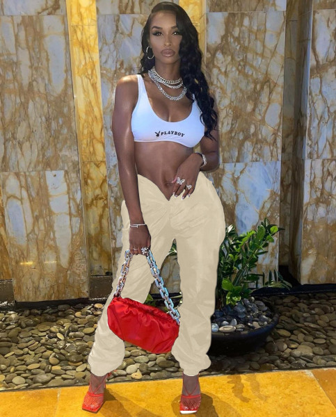 Women's solid color memory fabric with open umbilical love opening pockets on both sides with zipper casual pants N6035