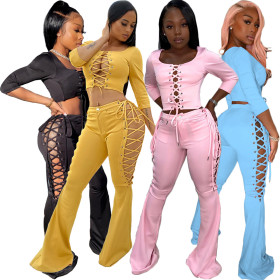 Two-piece flared trousers with square neck eyelet straps and buttons S177