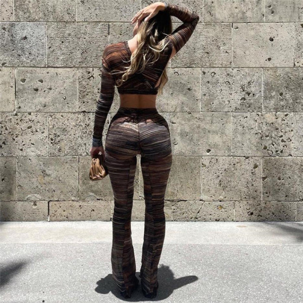 Autumn European and American foreign trade women's new style sexy hollow printed slim top high waist tight trousers suit K21S07528