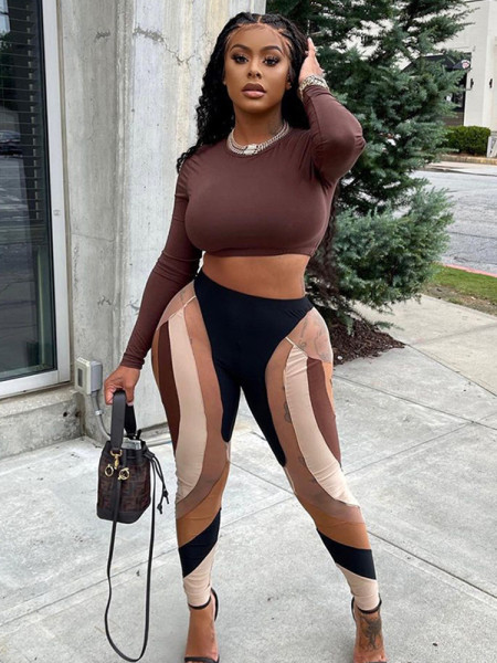 Fashion women's autumn new printed high-waisted slim casual casual hollow trousers stitching trousers