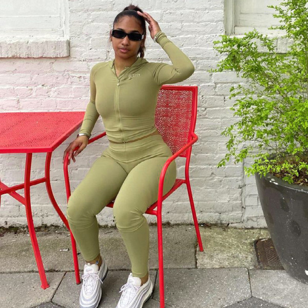 Fashion women's 2021 autumn solid color short hooded top sexy tight trousers suit