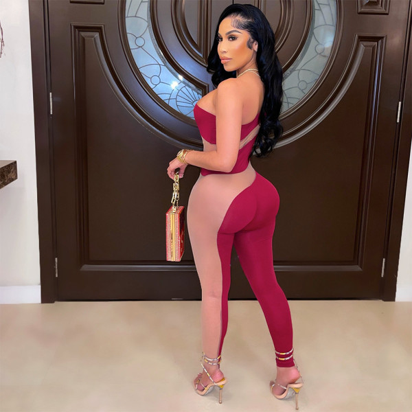 Fashionable sexy oblique shoulder tight-fitting see-through jumpsuit reveals a slim figure new style