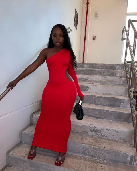 Nightclub asymmetrical slanted shoulder solid color sexy hole dress