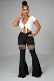 New style solid color casual washed denim flared pants with straps for autumn and winter