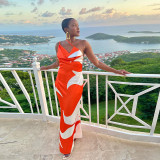 The new irregularly printed halter dress with slanted side straps