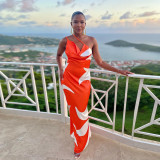 The new irregularly printed halter dress with slanted side straps