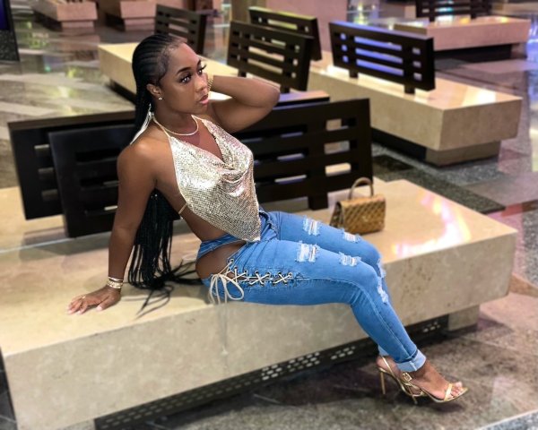 Women's new style stretch jeans with side straps and exposed waist