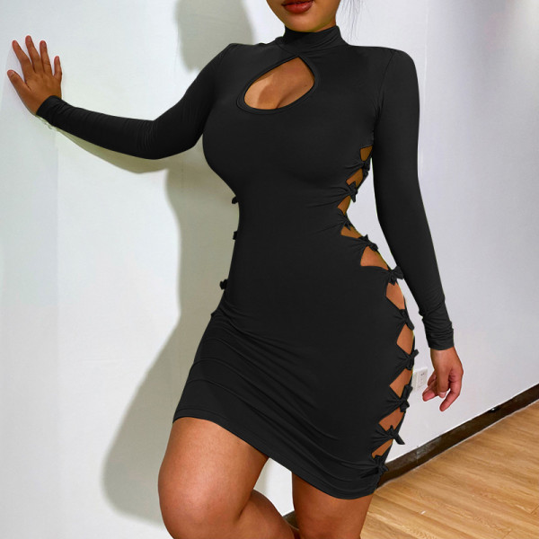 Tie knot hollow long-sleeved dress women 2021 European and American cross-border sexy temperament simple little dress
