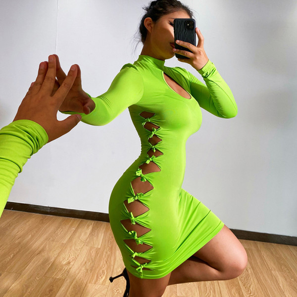 Tie knot hollow long-sleeved dress women 2021 European and American cross-border sexy temperament simple little dress