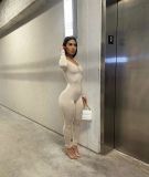 New women's sexy tight-fitting V-neck pleated solid color long-sleeved jumpsuit one-piece pants