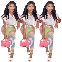 Solid color cropped shirt and screen print trousers Solid color cropped shirt and screen print trousers