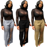 Solid color burnt hole zipper flared pants single pants