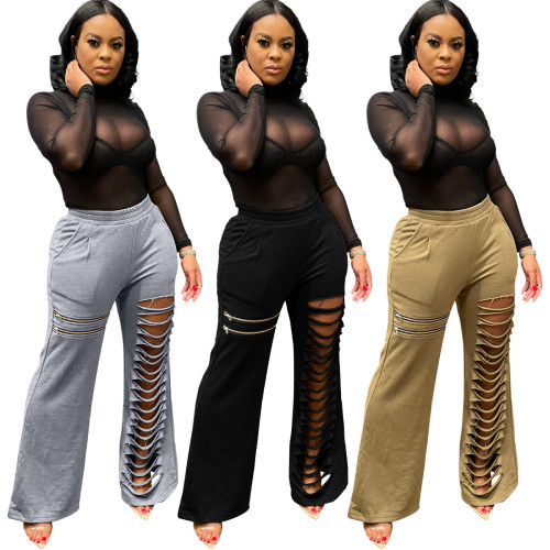 Solid color burnt hole zipper flared pants single pants