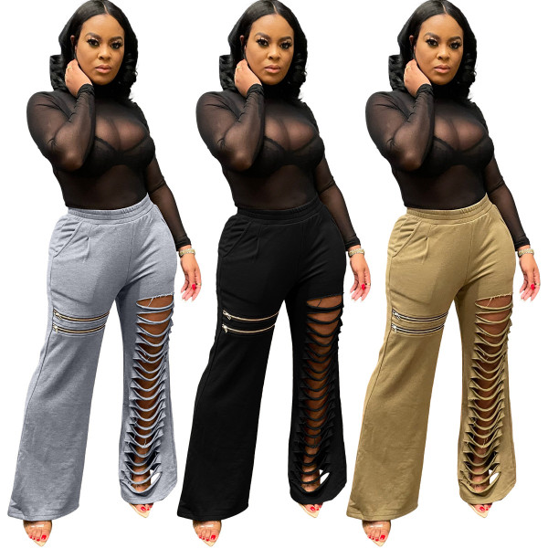 Solid color burnt hole zipper flared pants single pants