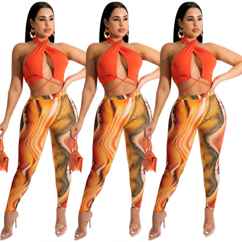 Sexy halterneck solid color top + printed trousers two-piece set