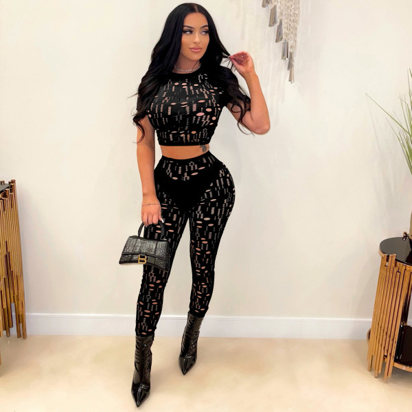 Hole solid color tight sexy sports and leisure two-piece suit
