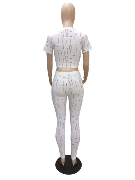 Hole solid color tight sexy sports and leisure two-piece suit