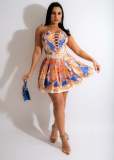 Fashion sexy tube top and eye straps irregular printed pleated skirt suit