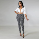 Fashionable and sexy deep V-neck tied hollow print tight suit two tie methods