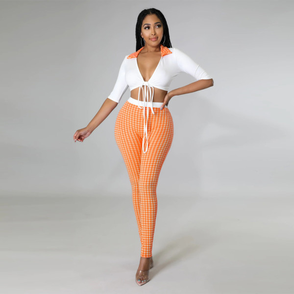 Fashionable and sexy deep V-neck tied hollow print tight suit two tie methods