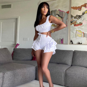 Fashion women's solid color design sense bandage lace stitching wide-leg shorts summer