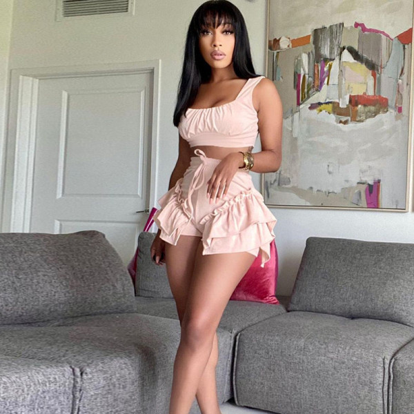 Fashion women's solid color design sense bandage lace stitching wide-leg shorts summer