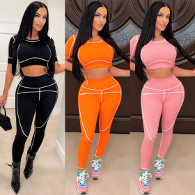 Fashion New Casual Tight Sports Short Sleeve Solid Color Pants Two Piece Set