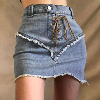 Fashionable and sexy stitching brushed eyelet lace-up denim skirt