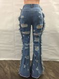 Front and rear ripped loose tassel flared jeans
