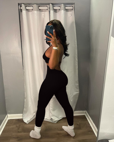 Fashion sexy backless suspenders solid color casual jumpsuit