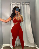 Fashion sexy backless suspenders solid color casual jumpsuit
